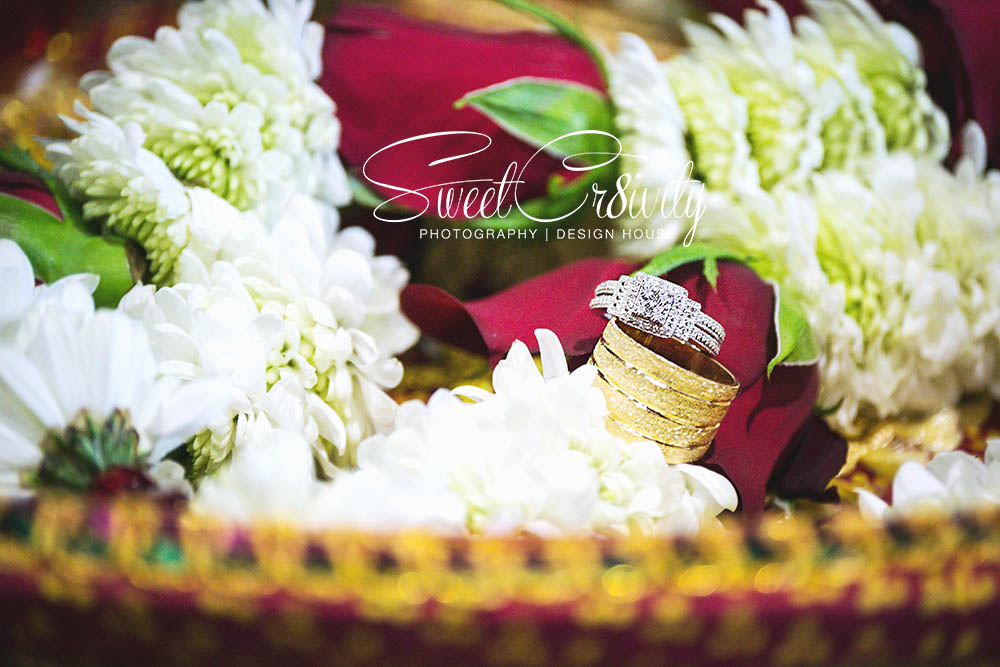 south indian wedding,radiant bride,shallcross temple hall,red bridal sari,tamil bride,creative wedding photography durban,sweetcr8ivity,wedding rings,thali,garlands,durban wedding photography