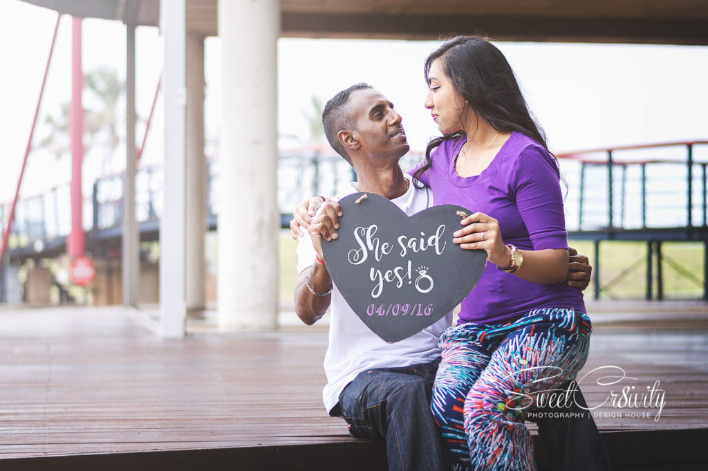 surprise proposal photoshoot durban,sweetcr8ivity,wedding photographers,ushaka marine world,she said yes,heart,creative photography,hugs and kisses,great gatsby,diamond ring,sweethearts