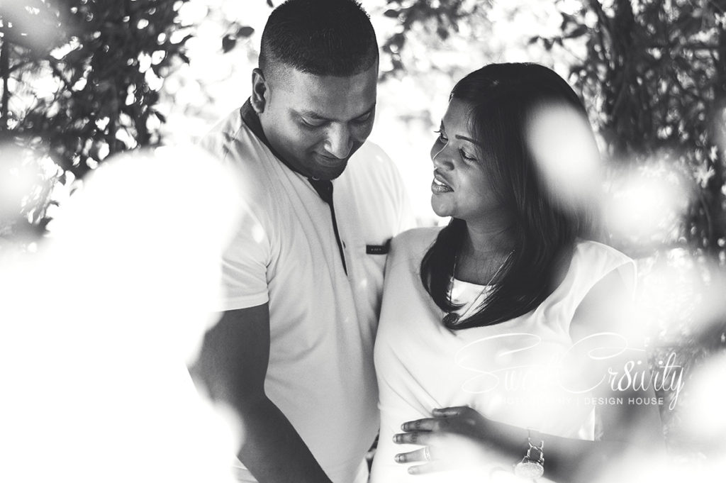 its a girl,damien and humsha,first baby,durban botanical gardens,sweetcr8ivity,aveen elaine lutchman,pink booties,white maternity dress,belly kiss,creative blurs,depth of field