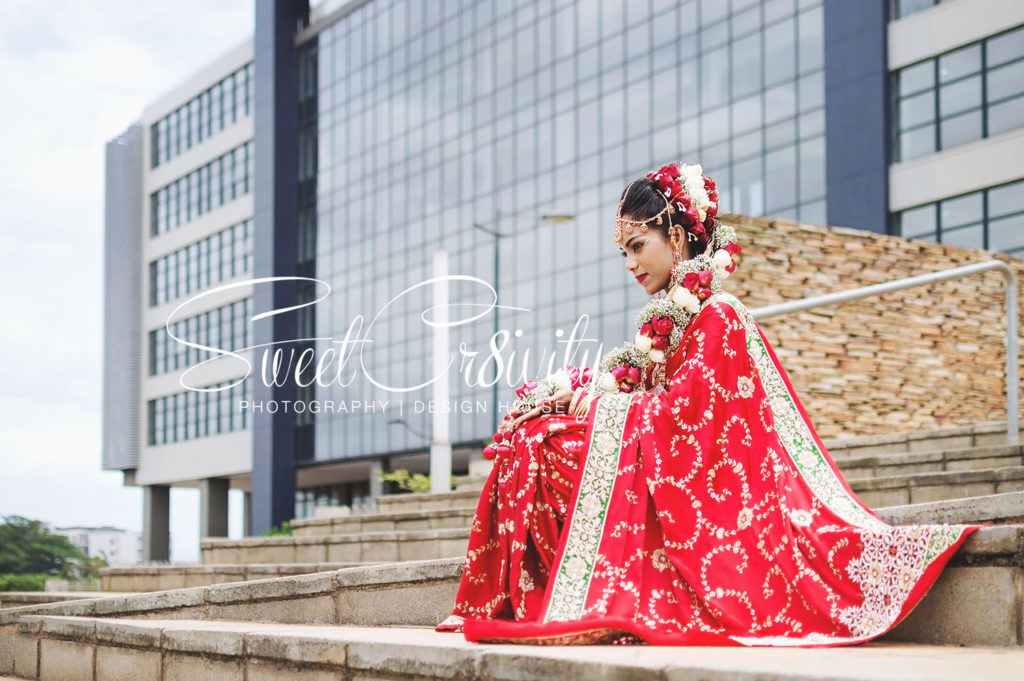 tamil wedding,chris saunders park creative shoot,bridal couple,durban wedding photographers,umhlanga,red bridal sari,long south indian plait,shree emperumal temple hall mt edgecombe,red and white roses,mala,thali,rings,prevern and lushal,elaine and aveen lutchman,toe rings,beautiful bride,love,wedding photographers durban