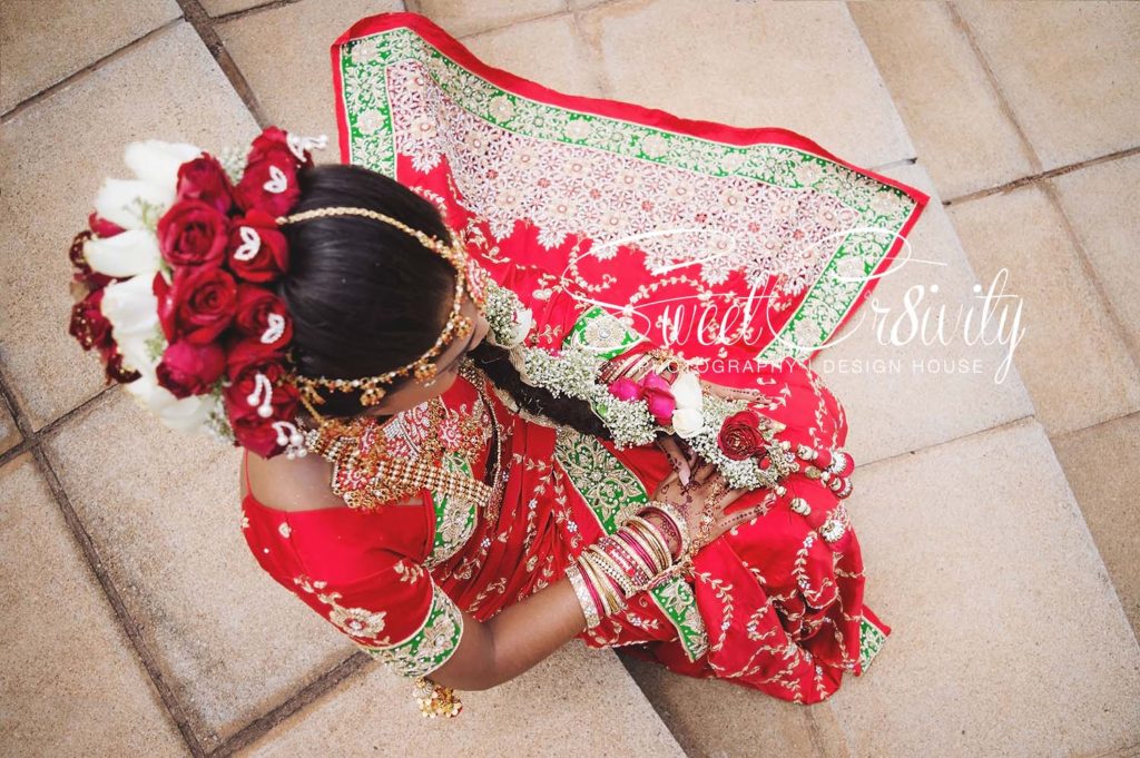 tamil wedding,chris saunders park creative shoot,bridal couple,durban wedding photographers,umhlanga,red bridal sari,long south indian plait,shree emperumal temple hall mt edgecombe,red and white roses,mala,thali,rings,prevern and lushal,elaine and aveen lutchman,toe rings,beautiful bride,love,wedding photographers durban