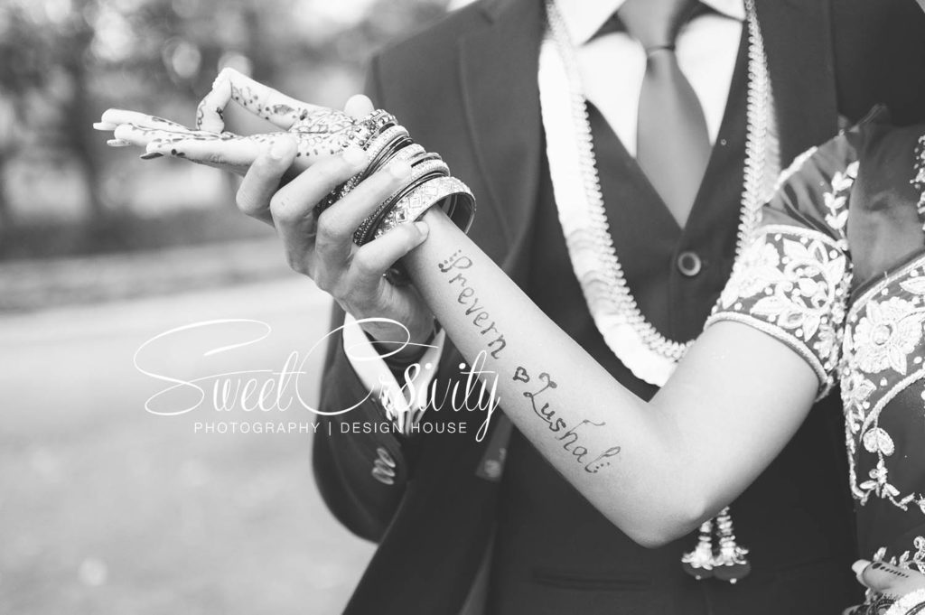 tamil wedding,chris saunders park creative shoot,bridal couple,durban wedding photographers,umhlanga,red bridal sari,long south indian plait,shree emperumal temple hall mt edgecombe,red and white roses,mala,thali,rings,prevern and lushal,elaine and aveen lutchman,toe rings,beautiful bride,love,wedding photographers durban