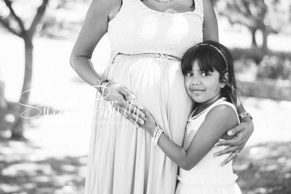 chris saunders park,umhlanga, creative photography,its a girl,nikara,lushen,pink maternity dress,pregnancy shoot,family photography,sweetcr8ivity,elaine and aveen,red car
