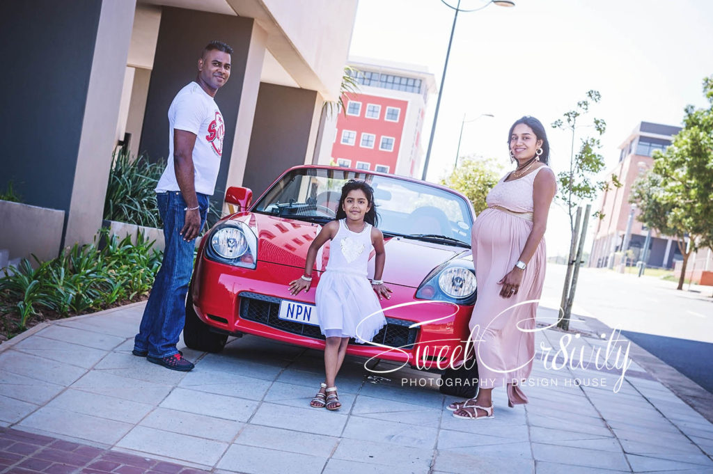 chris saunders park,umhlanga, creative photography,its a girl,nikara,lushen,pink maternity dress,pregnancy shoot,family photography,sweetcr8ivity,elaine and aveen,red car
