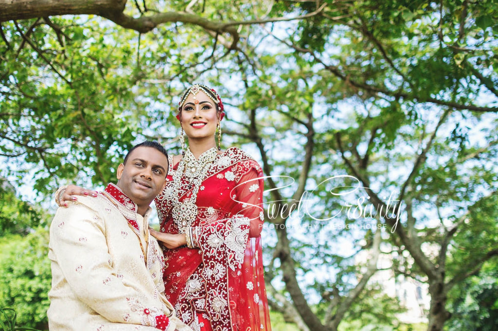 always and forever,mumbai dream events,red bridal lehenga,south indian bride,theshan bridal styler,aunty sheila,mount edgecombe conference center,mr and mrs,makeup artist,umhlanga,durban wedding photographers,sweetcr8ivity,elaine and aveen lutchman,diamond rings,chris saunders park,odyssey sound and lighting,love,happiness,weddings,bridal garland,unique designer cakes,xclusive events,filmco productions,sagie murugan,thali