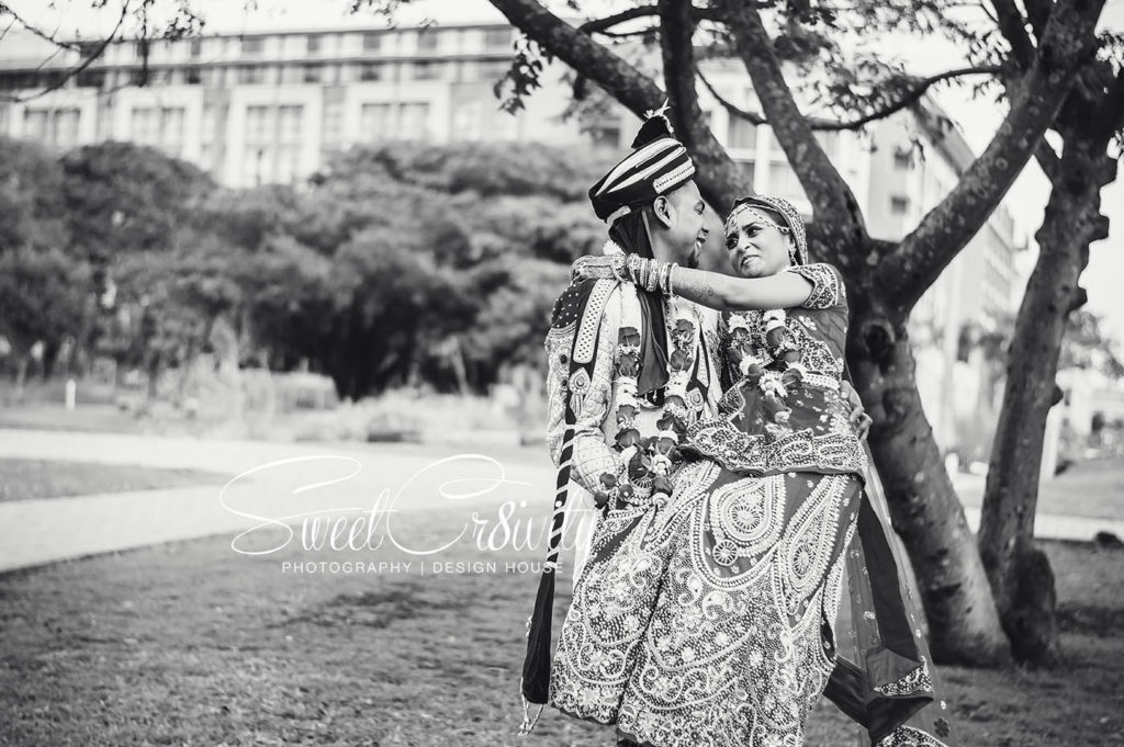 best durban wedding photographers,umhlanga,chris saunders park,kraydeb conference center,bride,groom,bridesmaids gowns,creative photography,north indian wedding photography,makeup and things, reena hanuman,makeup artist,red bridal lehenga