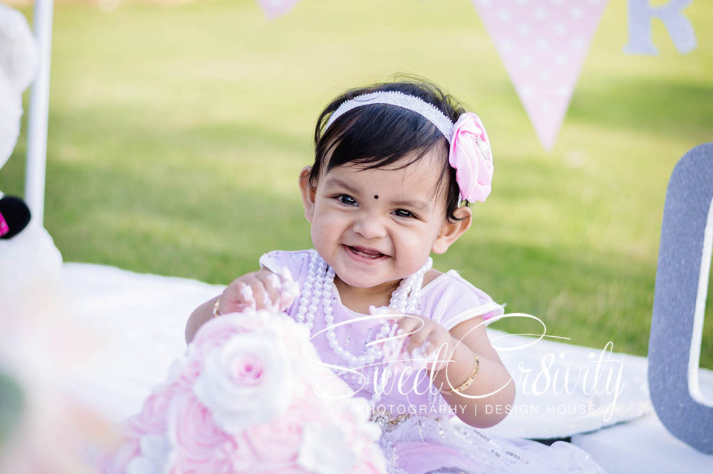 family shoot,1st birthday cakesmash,llitte girl,flowers themed cake,foot beads,sweetcr8ivity,elaine and aveen lutchman,umhlanga photoshoots,chris saunders park,daddys little girl,cute baby,love,laughter,creative shoots,pearls and sparkles,photography props