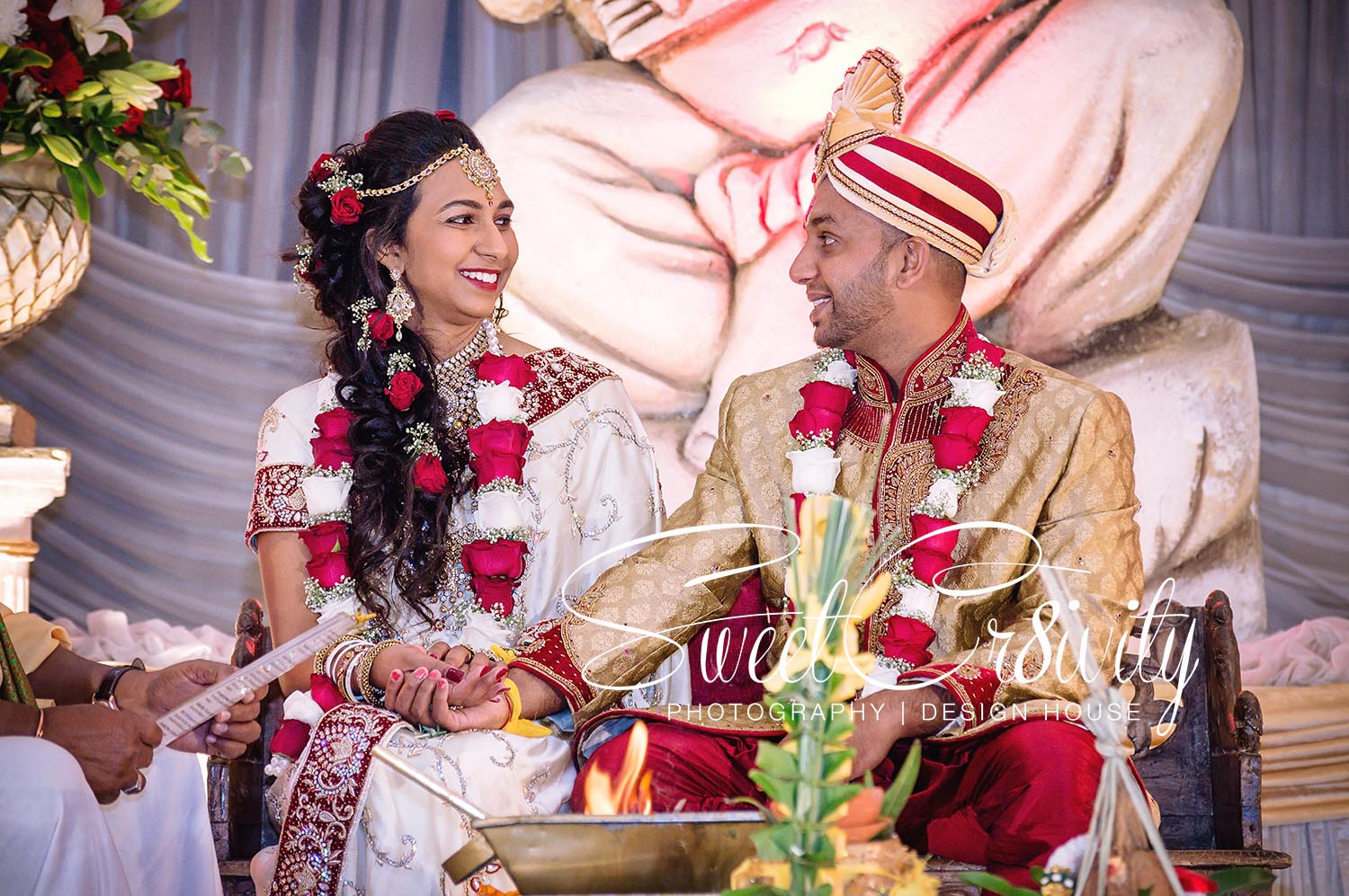 south and north indian wedding fusion,creative photography,snap that video, best wedding photographers in durban, durban botanical gardens,bridal,white bridal sari,umngeni road temple,de malas hair salon, sweetcr8ivity,elaine and aveen lutchman, indian delights caterers, koogan pillay decor, love,laughter,happiness,capturing emotions,grooms car,turban,gold ganesha,diy centerpieces,red white and gold theme,wedding favors,tiffany chairs,roses