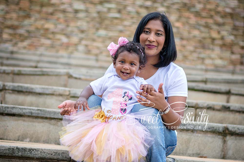 minnie mouse themed cakesmash,family shoot,one,umhlanga,chris saunders park,venesha,elaine and aveen lutchman,smashed cake,roses,tutus and bows,fingers in cake,happy baby,SweetCr8ivity