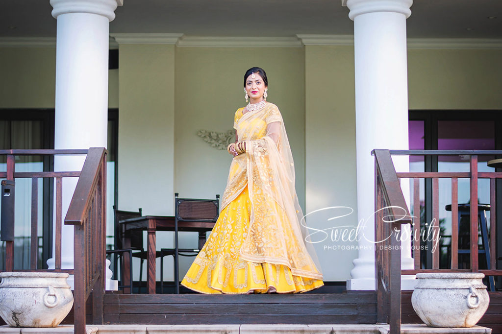 mount edgecombe country club, weavers nest, nelengu night, siasha weds dersen, yellow lehenga, landscape, best durban wedding photographers, south indian wedding, elaine and aveen lutchman, bhagwans caterers, black and white photography, indian beauty, happiness, night before, macaroon wedding favors, vintage themed cake, gold carts, depth of field, gold bangles, details, golden hour