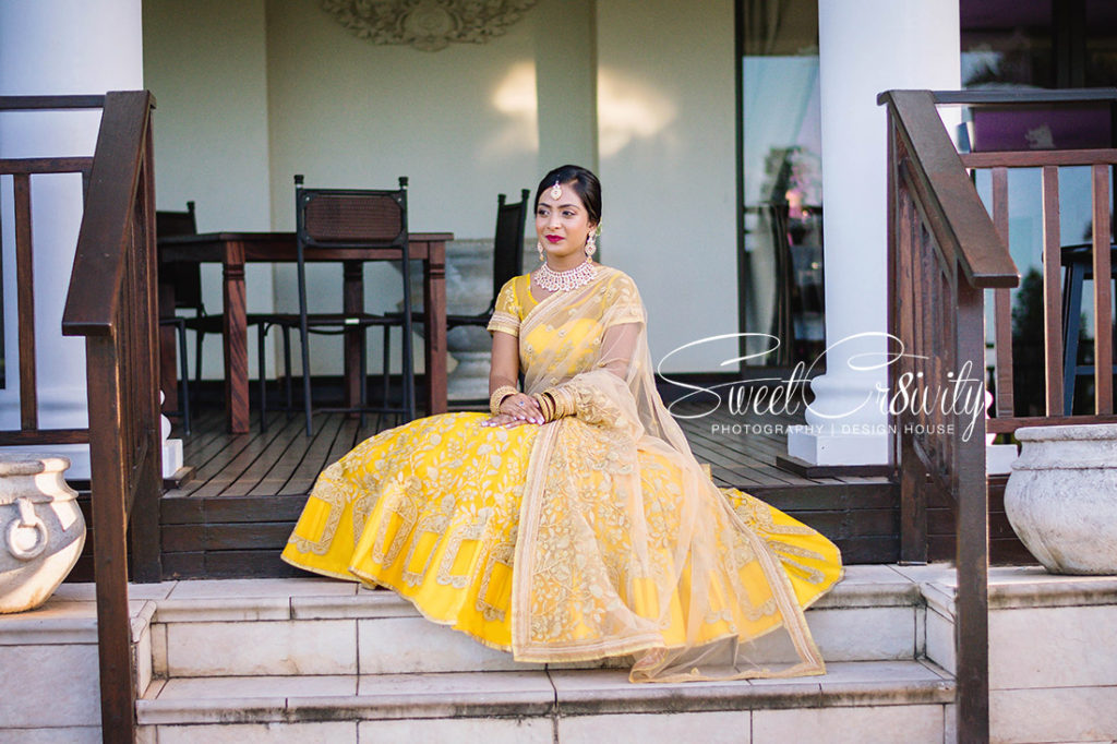 mount edgecombe country club, weavers nest, nelengu night, siasha weds dersen, yellow lehenga, landscape, best durban wedding photographers, south indian wedding, elaine and aveen lutchman, bhagwans caterers, black and white photography, indian beauty, happiness, night before, macaroon wedding favors, vintage themed cake, gold carts, depth of field, gold bangles, details, golden hour