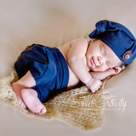 newborn photographer durban,its a boy,baby,newborn wraps,mum and child,posing,creative photography,moody blues ,themed shoots,shot from above, baby in a basket,knitted newborn props,teddy bear,diy outfits, cute smiles