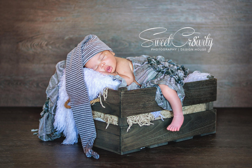 newborn photographer durban,its a boy,baby,newborn wraps,mum and child,posing,creative photography,moody blues ,themed shoots,shot from above, baby in a basket,knitted newborn props,teddy bear,diy outfits, cute smiles,small hands, golden furry layer, sleepyhead