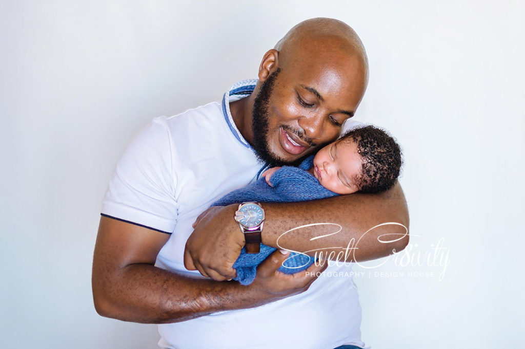 newborn photographer durban,its a boy,baby,newborn wraps,mum and child,posing,creative photography,moody blues ,themed shoots,shot from above, baby in a basket,knitted newborn props,teddy bear,diy outfits, cute smiles,small hands, golden furry layer, sleepyhead,eyes open,doting dad