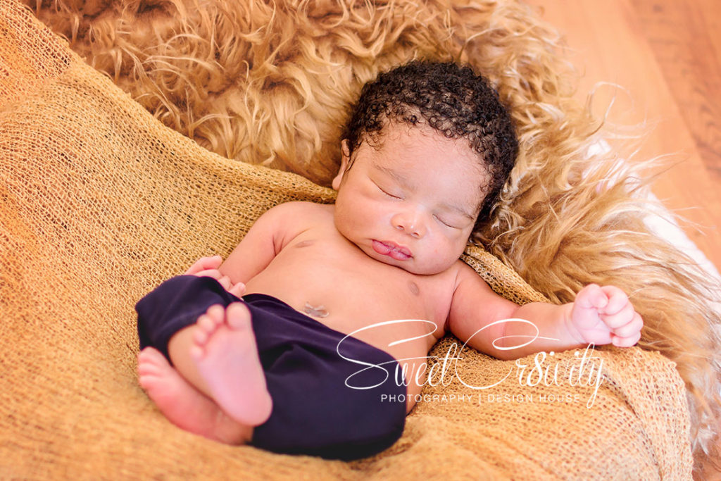 newborn photographer durban,its a boy,baby,newborn wraps,mum and child,posing,creative photography,moody blues ,themed shoots,shot from above, baby in a basket,knitted newborn props,teddy bear,diy outfits, cute smiles,small hands, golden furry layer, sleepyhead,eyes open,doting dad