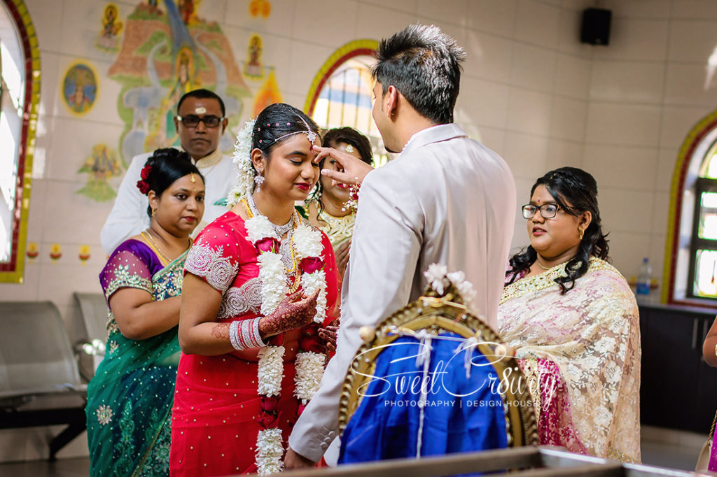 sweetcr8ivity,best durban wedding photographers, elaine and aveen lutchman, we love weddings, south indian bride, red sari, thali, Kharwastan Temple Hall,snap that, videography, cas weds sam, traditional, mehendi, its official,bmw,creative shots,coconut,fire,maharajs caterers