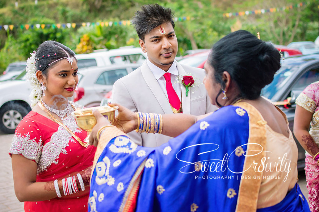 sweetcr8ivity,best durban wedding photographers, elaine and aveen lutchman, we love weddings, south indian bride, red sari, thali, Kharwastan Temple Hall,snap that, videography, cas weds sam, traditional, mehendi, its official,bmw,creative shots,coconut,fire,maharajs caterers