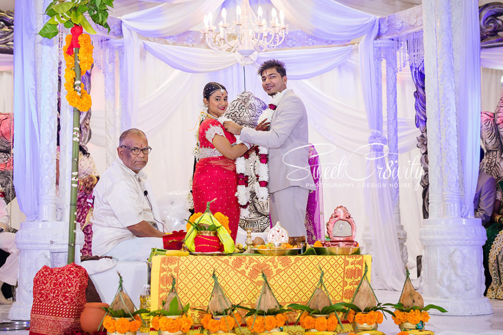 sweetcr8ivity,best durban wedding photographers, elaine and aveen lutchman, we love weddings, south indian bride, red sari, thali, Kharwastan Temple Hall,snap that, videography, cas weds sam, traditional, mehendi, its official