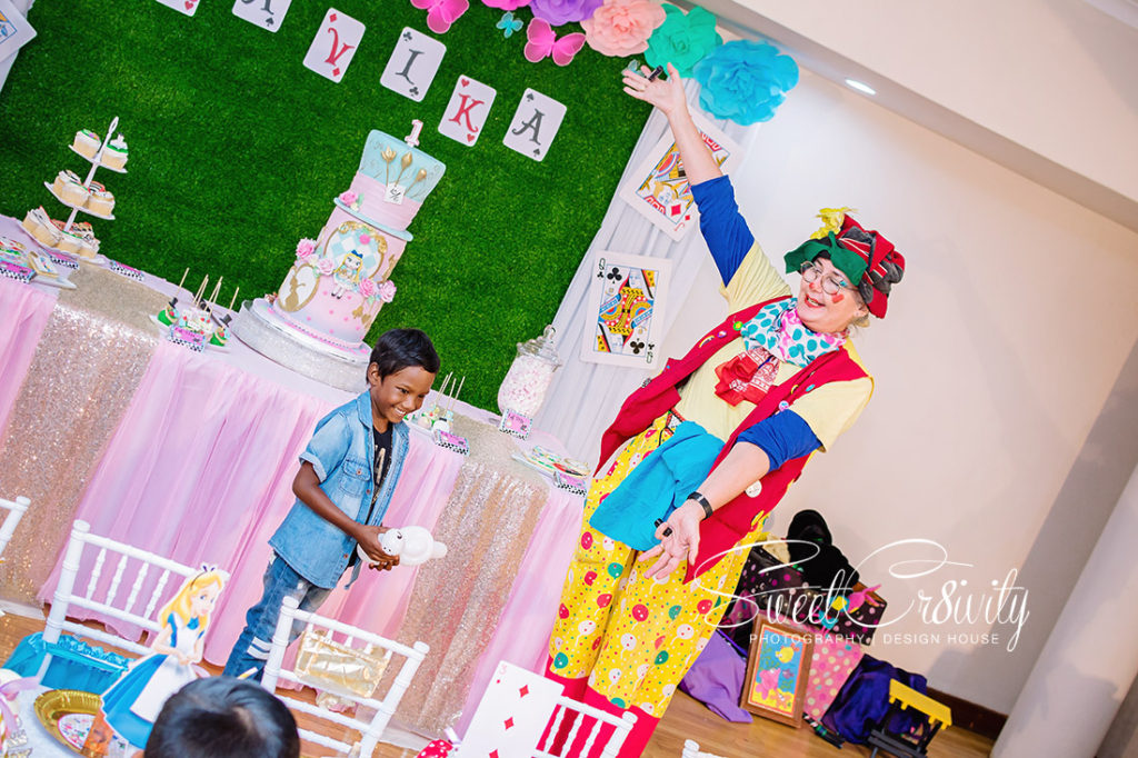 1st birthday party, alice in wonderland, themed, claires magical parties, sweetcr8ivity, elaine and aveen lutchman, the winchester function venue, clown
