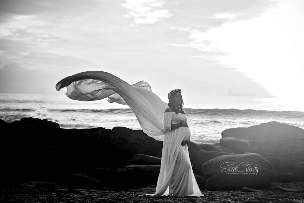 Maternity shoot, pregnancy announcement, gender reveal, its a girl, umhalanga, best durban wedding photographers, sunrise, golden hour, umhlanga pier, durban photographer, sweetcr8ivity, elaine and aveen lutchman, belly and button maternity dress hire, rocks, beach, flower crown, love, laughter
